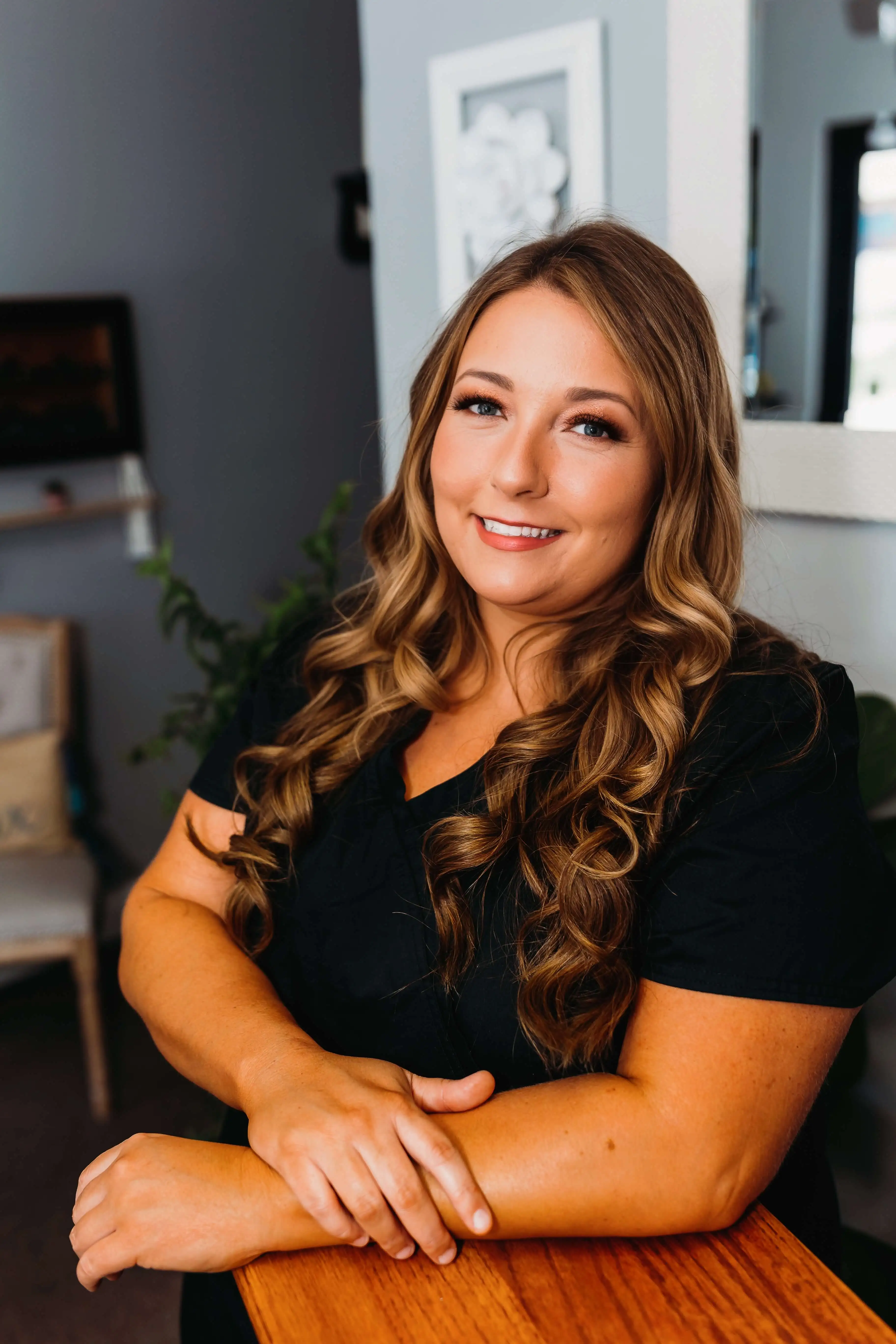 Portrait of a professional massage therapist in a black shirt